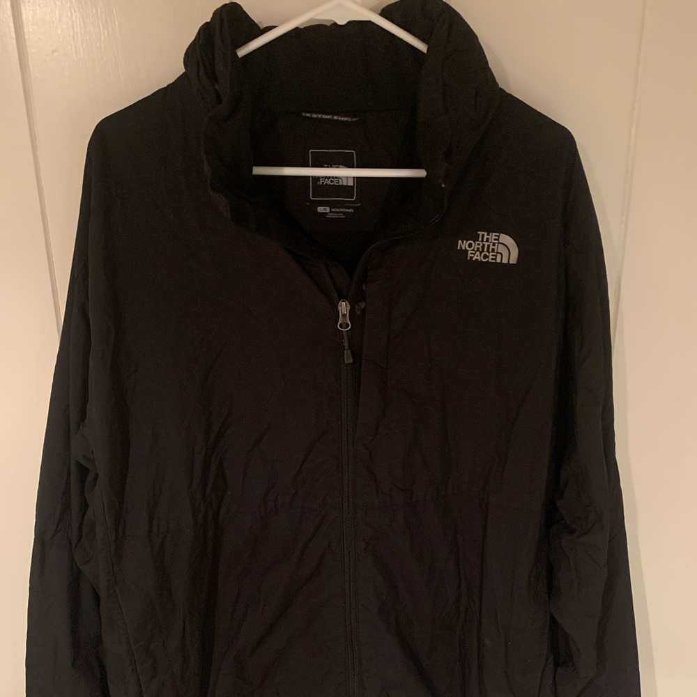 Mens North Face full zip wind breaker with hood.